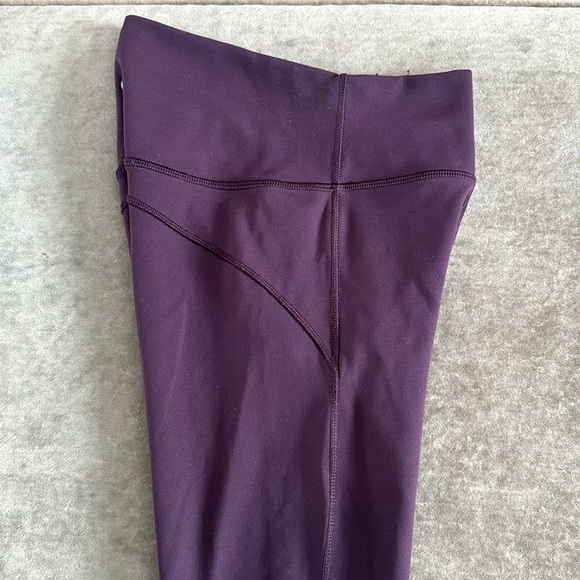Lululemon In Movement tight. Inseam 25 inches. Color- eggplant. Size- 2 - Picture 3 of 8